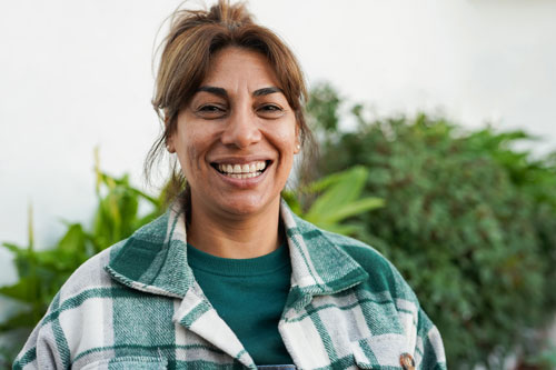 Happy mature Latin woman smiling